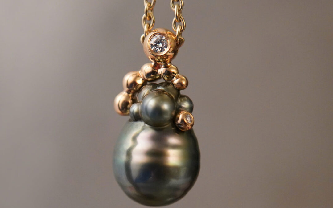 Unika perle med egne kugler, guld og diamanter