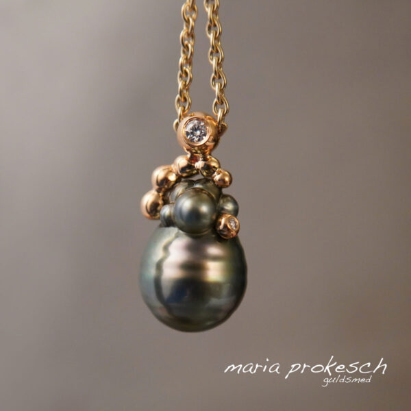 Unika perle med egne kugler, guld og diamanter