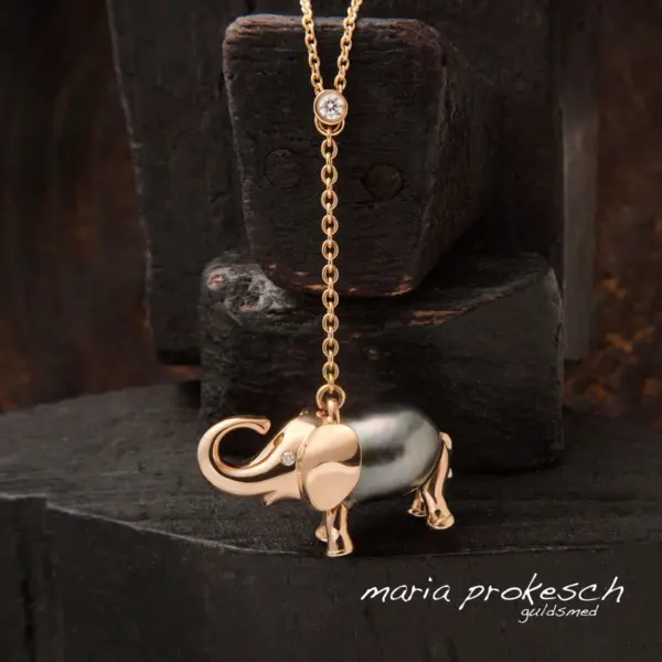 Unik perle smykke,svævende elefant i fuld figur
